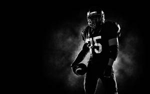 Monochromatic College Football Player Wallpaper