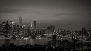 Monochromatic Skyline – A Stunning Black And White Cityscape Wallpaper