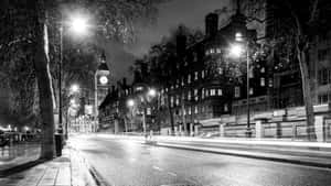 Monochrome Cityscape: A Timeless Street Perspective Wallpaper