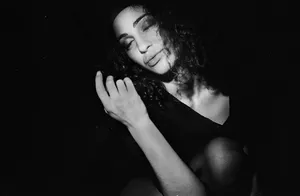 Monochrome_ Portrait_of_ Smiling_ Woman Wallpaper