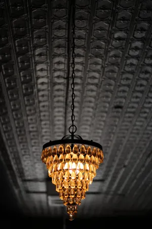Moody Chandelier Light Wallpaper