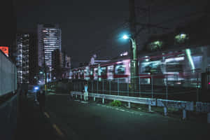 Moody_ Nighttime_ Train_ Station Wallpaper