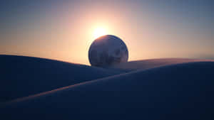 Moon Floating Behind Superficial Sand Deposits Wallpaper