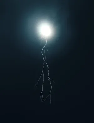 Moonlit_ Lightning_ Strike Wallpaper