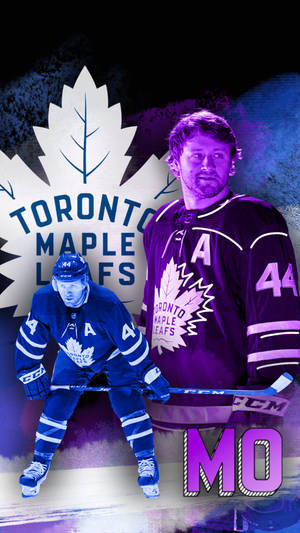 Morgan Rielly In Action With The Toronto Maple Leafs Wallpaper