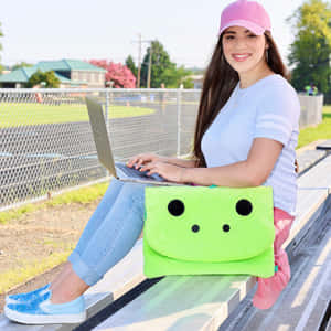 Moriah Elizabeth Typing On Laptop Wallpaper