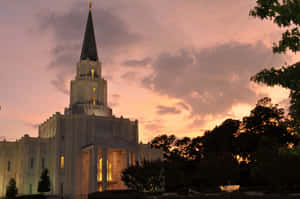 Mormon Temple Under Pink Sunset Sky Wallpaper