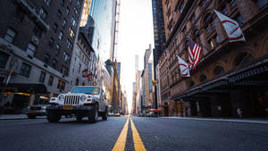 Morning City With Blue Bus Wallpaper