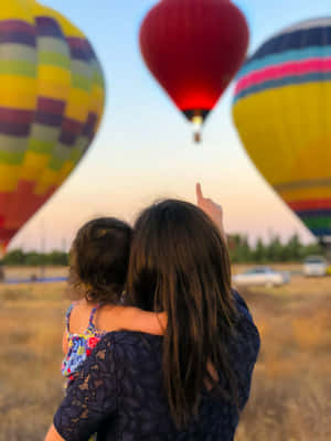 Mother Child Balloon Festival Moment.jpg Wallpaper