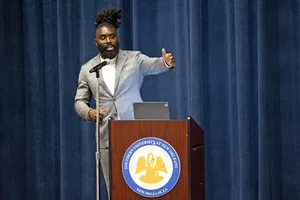 Motivational Speakerat Podium Wallpaper