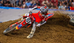 Motocross Racer Cornering Action Wallpaper