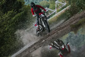 Motocross Rider Splashing Water.jpg Wallpaper