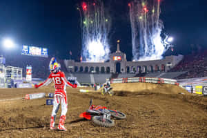 Motocross Victory Celebrationwith Fireworks Wallpaper