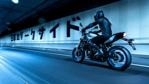 Motorcycle Riding In Tunnel Wallpaper