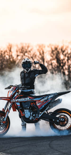 Motorcycle With Man Flexing[wallpaper] Wallpaper