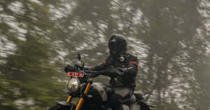 Motorcyclist Speed Blur Forest Backdrop Wallpaper