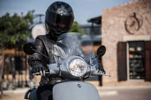 Motorcyclistin Black Leather Gear Wallpaper