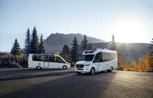 Motorhomes_in_ Mountain_ Sunset Wallpaper