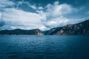 Mountain And Navy Blue Ocean Wallpaper