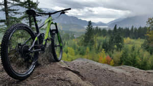 Mountain Bike Overlooking Scenic Valley.jpg Wallpaper