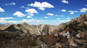 Mountain_ Goat_ Amidst_ Rocky_ Peaks.jpg Wallpaper