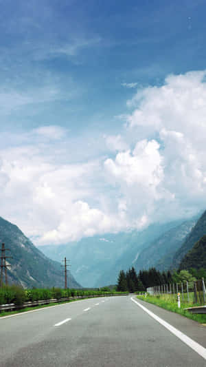 Mountain_ Road_ Clear_ Sky Wallpaper