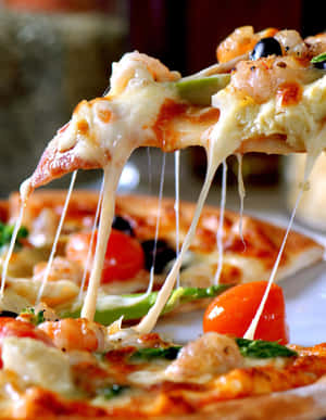 Mouthwatering Cheesy Pizza Slice.jpg Wallpaper