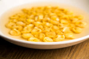 Mouthwatering Tortellini In Brodo, Italian Culinary Delight Wallpaper