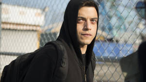 Mr. Robot Elliot Near Steel Fence Wallpaper