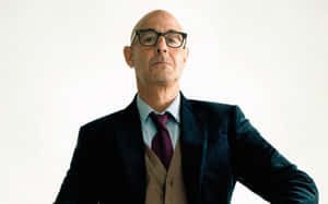 Multi-talented Actor Stanley Tucci In Suave Pose Wallpaper