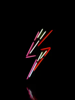 Multicolor Neon Lightning Bolt Logo Wallpaper