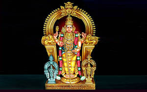 Murugan Statue Art With Two Smaller Statues Wallpaper