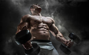 Muscle Man Holding Dumbbells Wallpaper