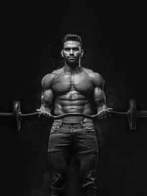 Muscular Man Curling Barbell Wallpaper