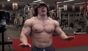 Muscular Man Gym Workout Expression Wallpaper