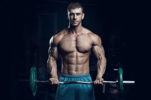 Muscular Man Performing Bicep Curls Wallpaper