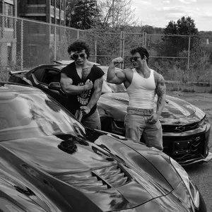 Muscular Twins With Sports Cars Wallpaper