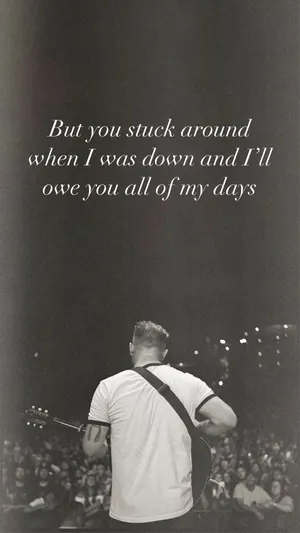 Musicianon Stagewith Inspirational Quote Wallpaper