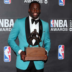 Mvp Player Holding Prestigious Nba Award Wallpaper