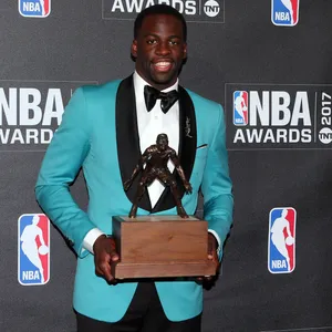 Mvp Player Holding Prestigious Nba Award Wallpaper