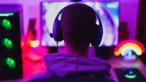 Myopic Person Playing Video Game Wallpaper