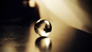 Mysterious Crystal Ball On A Dark Background Wallpaper