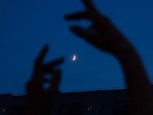 Mysterious Dark Hand Amidst Eerie Atmosphere Wallpaper