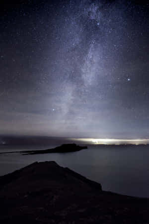 Mysterious Dark Island At Night Wallpaper