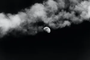 Mysterious Dark Moon In Night Sky Wallpaper