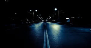 Mysterious Dark Road At Night Wallpaper