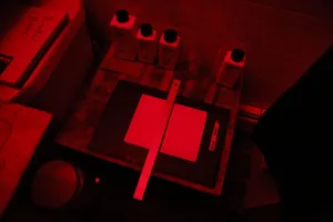 Mysterious Dark Room Illuminated By A Single Light Source Wallpaper