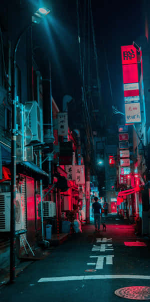 Mysterious Figure In A Neon-lit Cyberpunk Cityscape Wallpaper