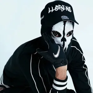 Mysterious_ Figure_in_ Skull_ Mask_and_ Cap Wallpaper