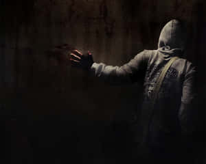 Mysterious Figure In The Shadows Wallpaper